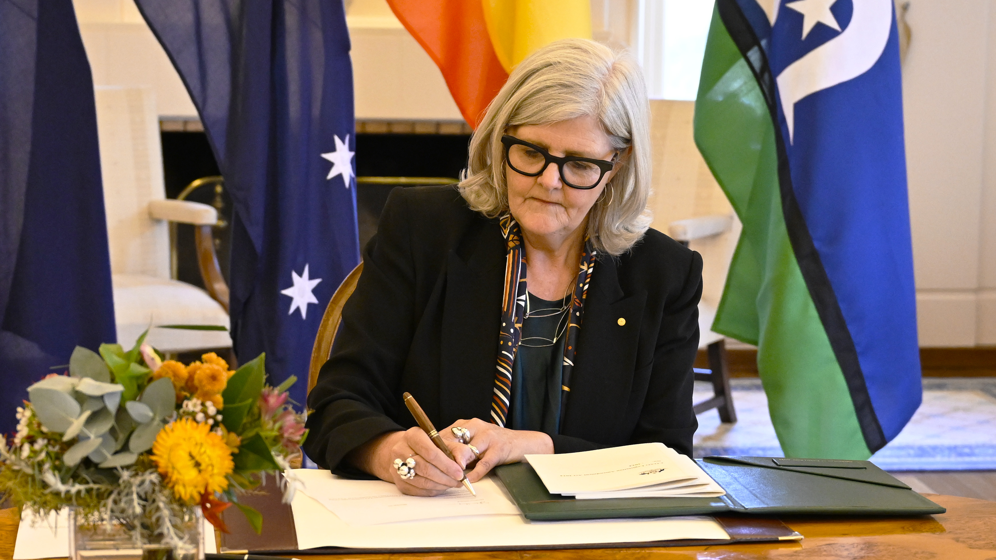 The Governor-General signing a bill