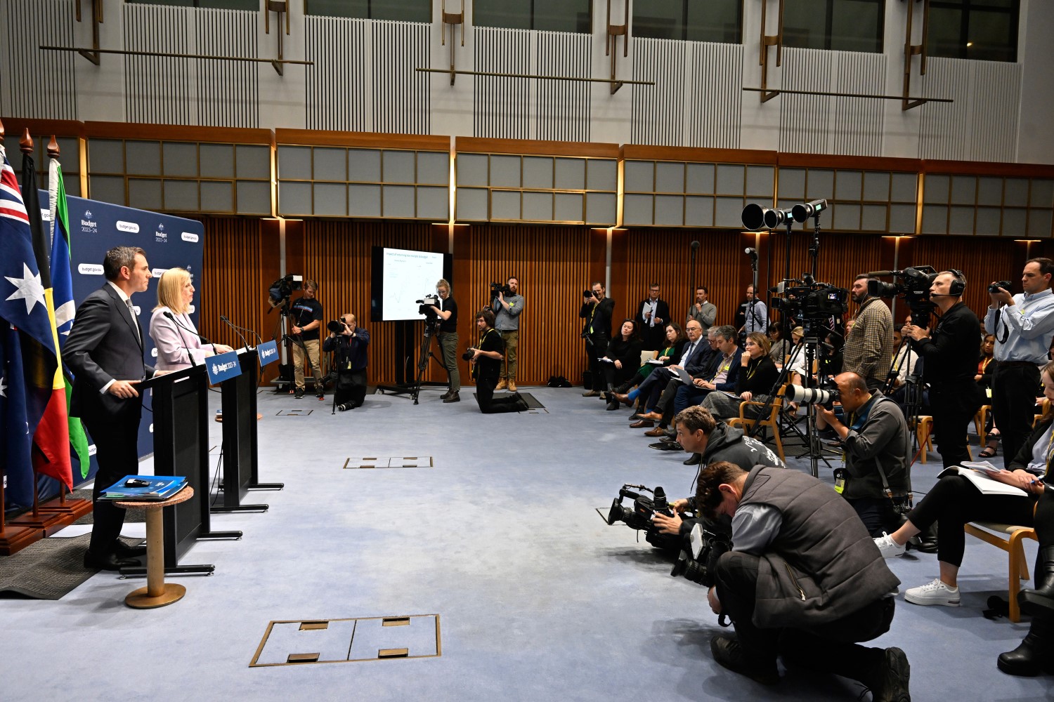 The Treasurer and the Minister for Finance talking to the media about the Budget